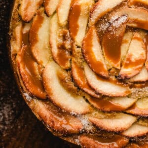 German Apple Cake drizzled with caramel sauce.