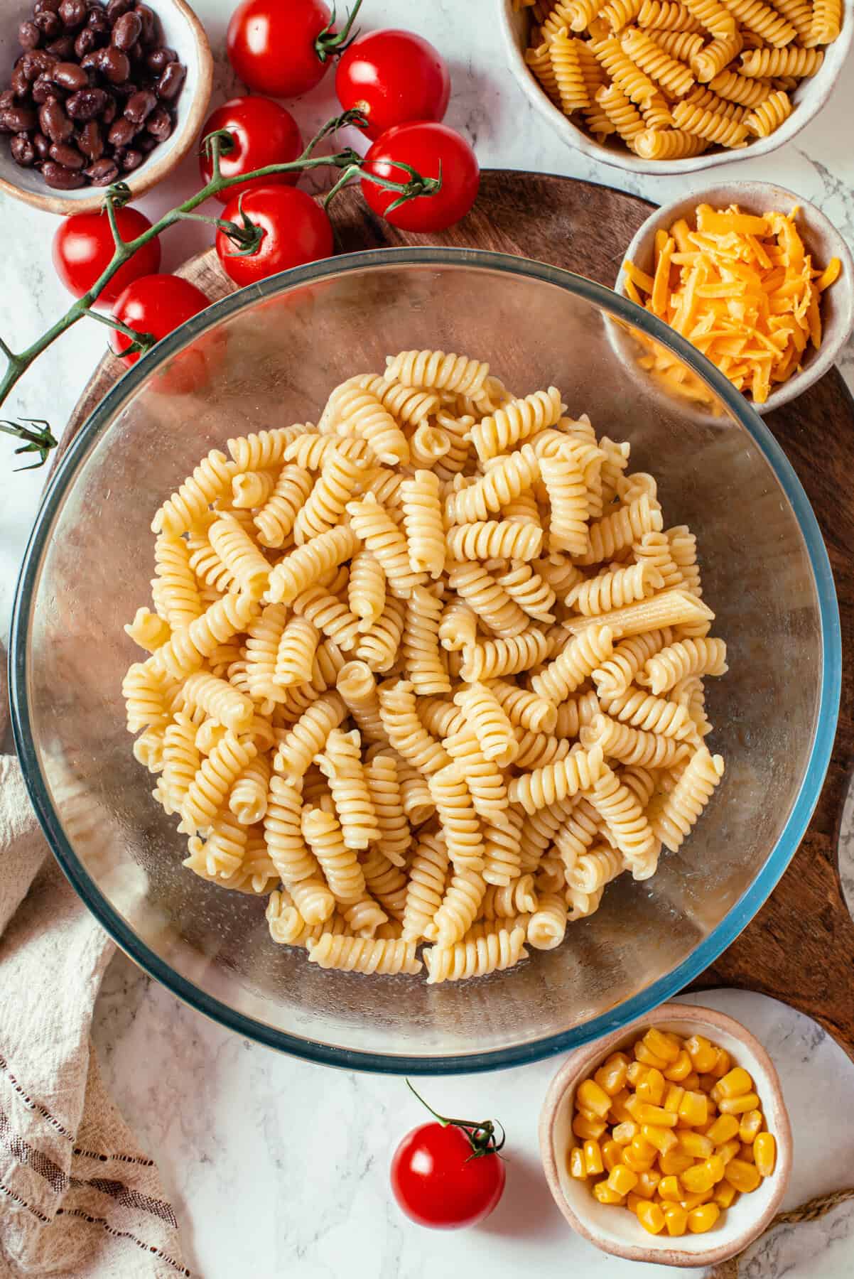 Cooked rotini pasta in a bowl.