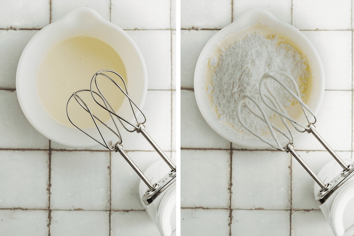 How to Make Mudslide Pie (Step-by-Step Photos) Side-by-side images of a white mixing bowl with electric beaters; the left bowl contains heavy cream, and the right bowl has powdered sugar on top of the heavy cream, ready to be mixed.