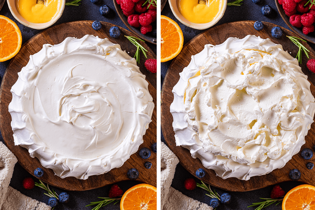 How to Make Pavlova (step-by-step photos) Side-by-side images of two pavlova bases on wooden boards, topped with swirled meringue. Surrounding them are orange halves, blueberries, raspberries, and small bowls of yellow sauce.