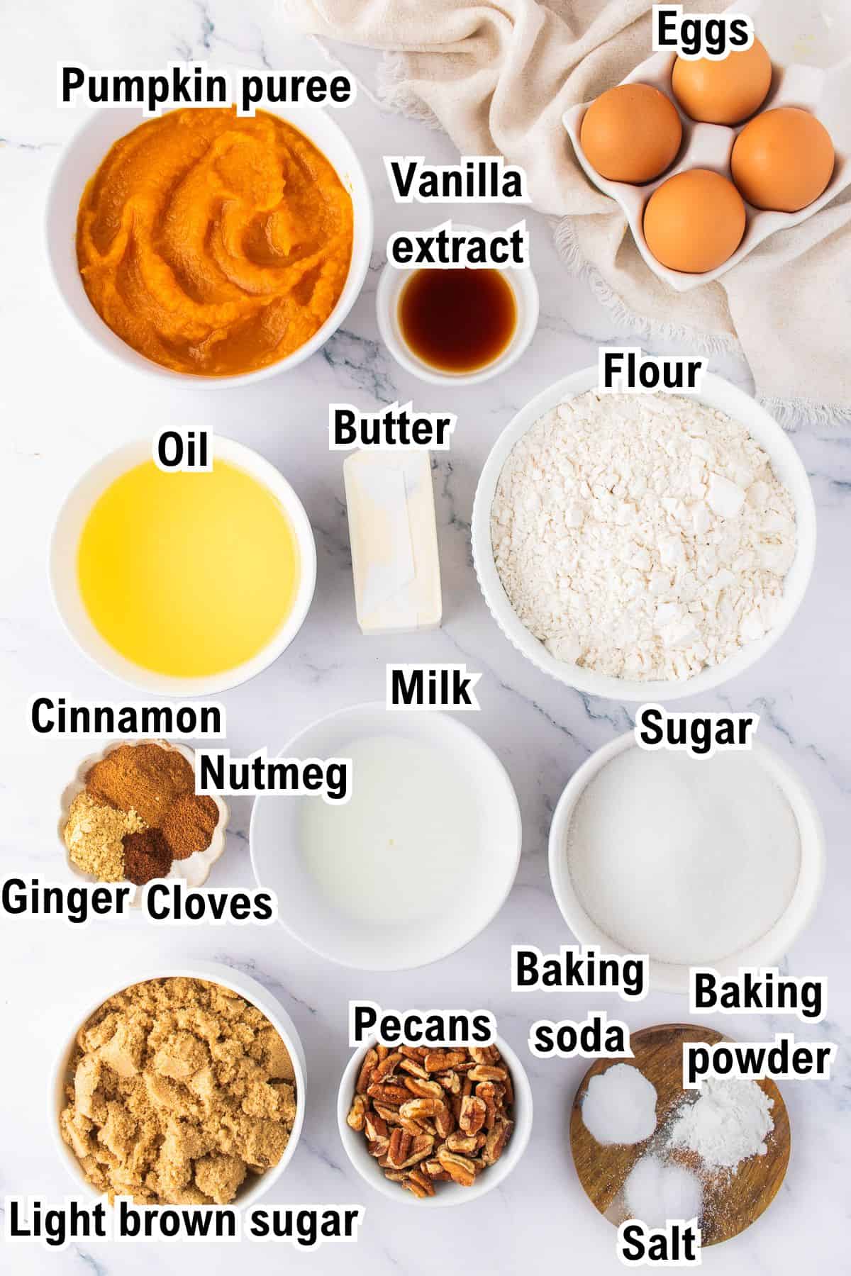 This photo shows all the ingredients (labeled) for Pumpkin Bundt Cake.