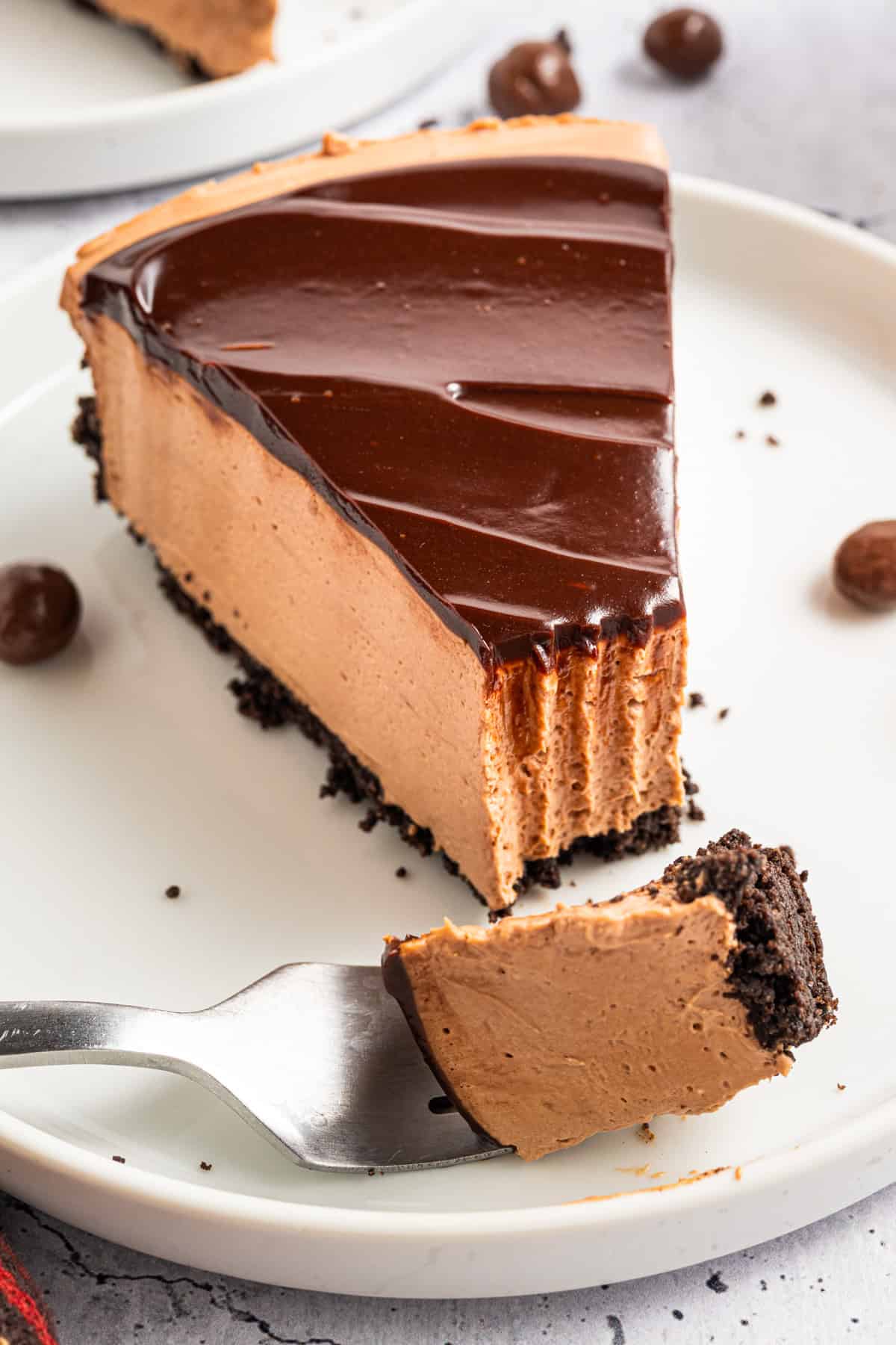 A slice of Mocha Cheesecake on a plate.