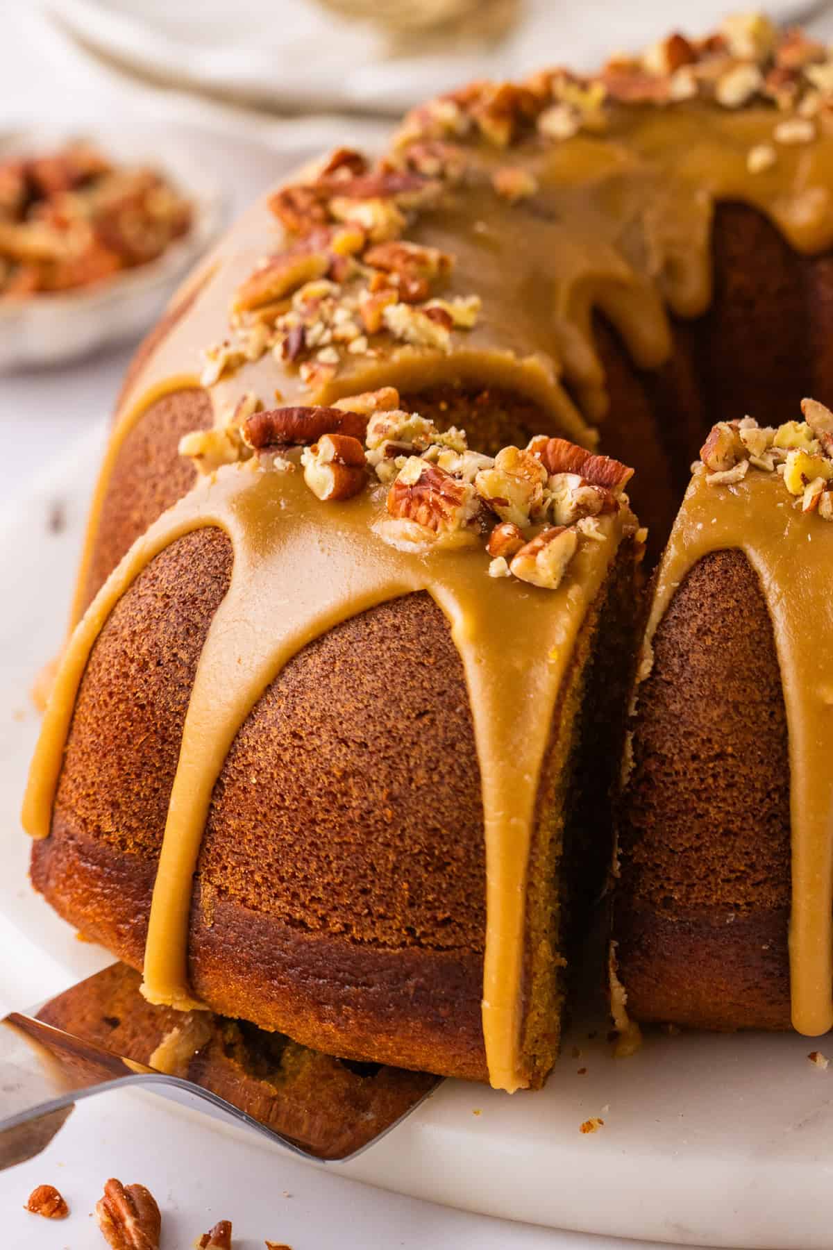 Pumpkin Bundt Cake Topped with Brown Sugar Glaze and Pecans