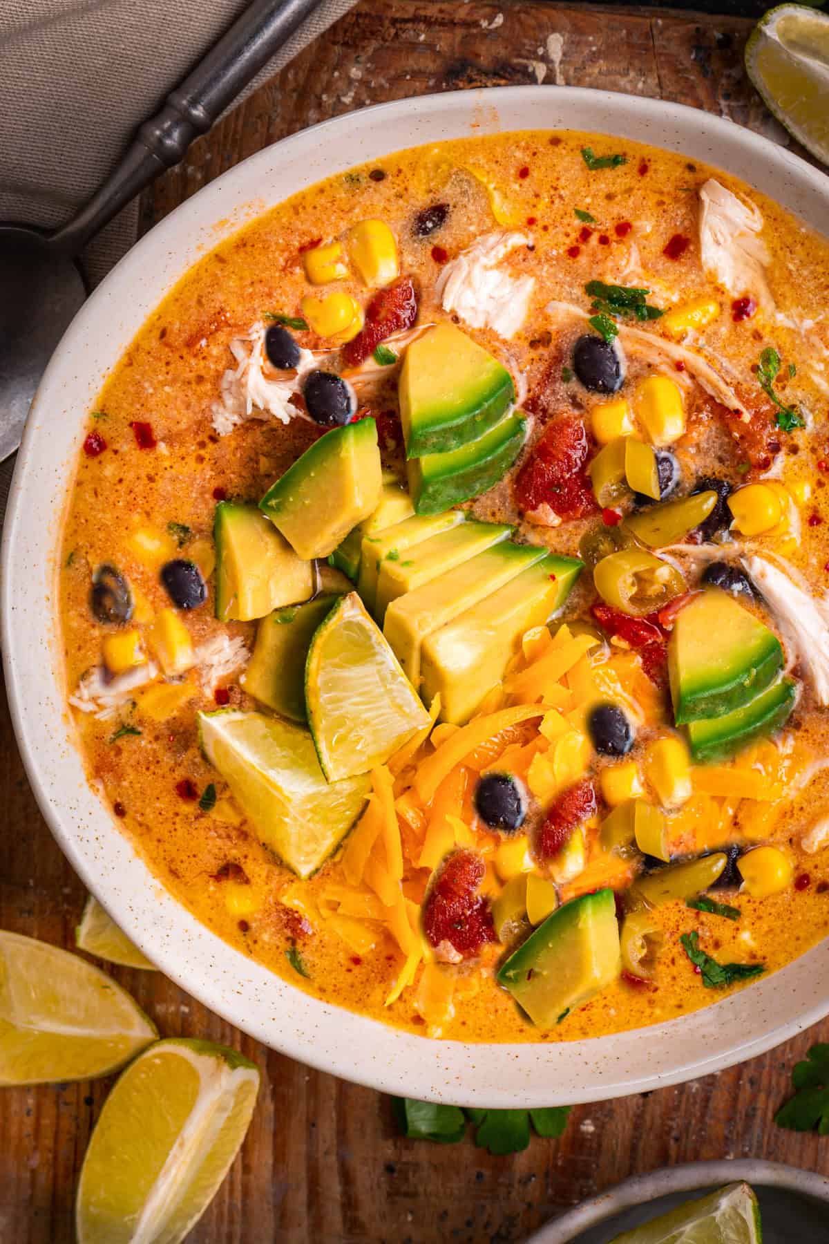 Creamy chicken enchilada soup in a bowl.