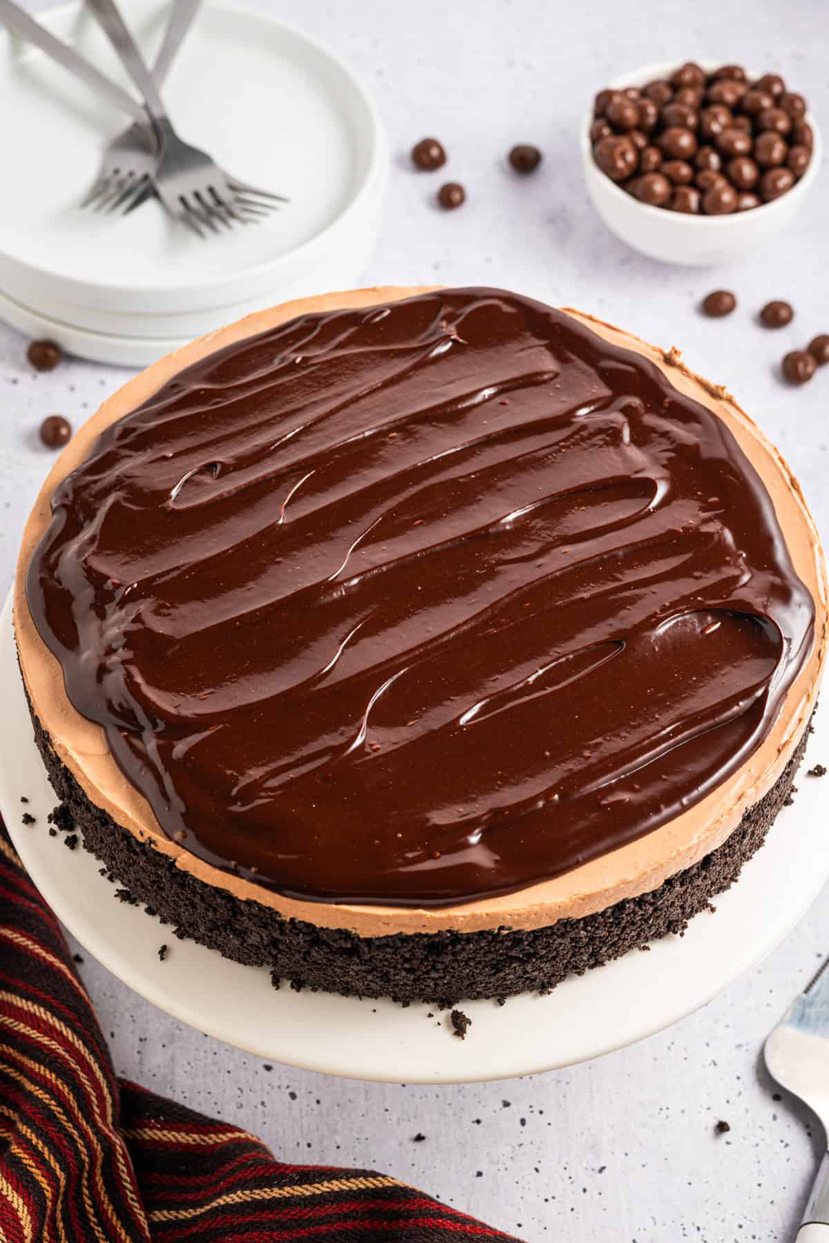 Mocha Cheesecake on a white cake platter.