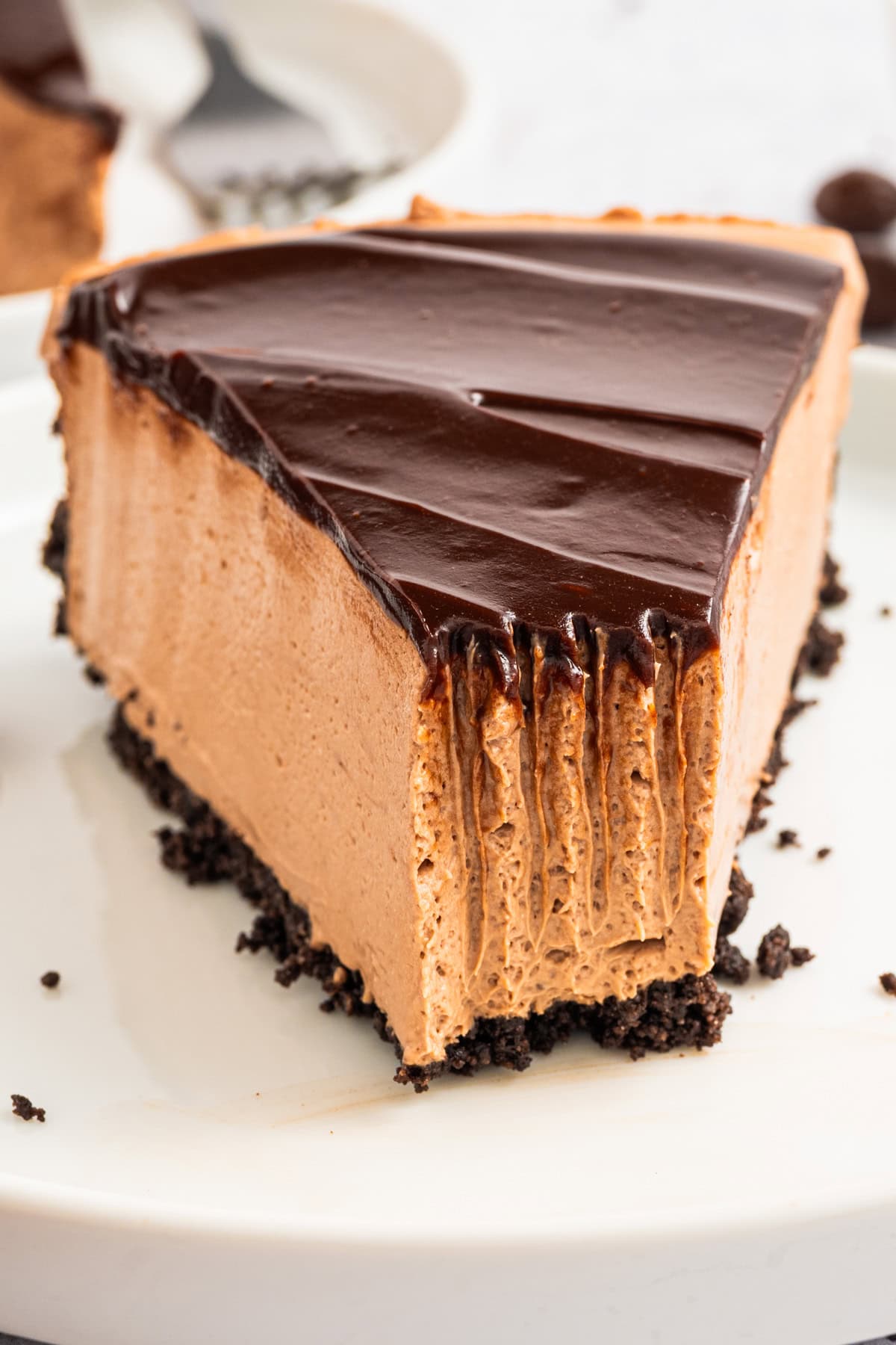 A slice of Mocha Cheesecake on a plate.