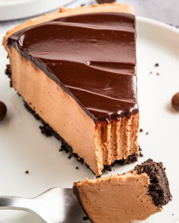 A slice of Mocha Cheesecake on a plate.