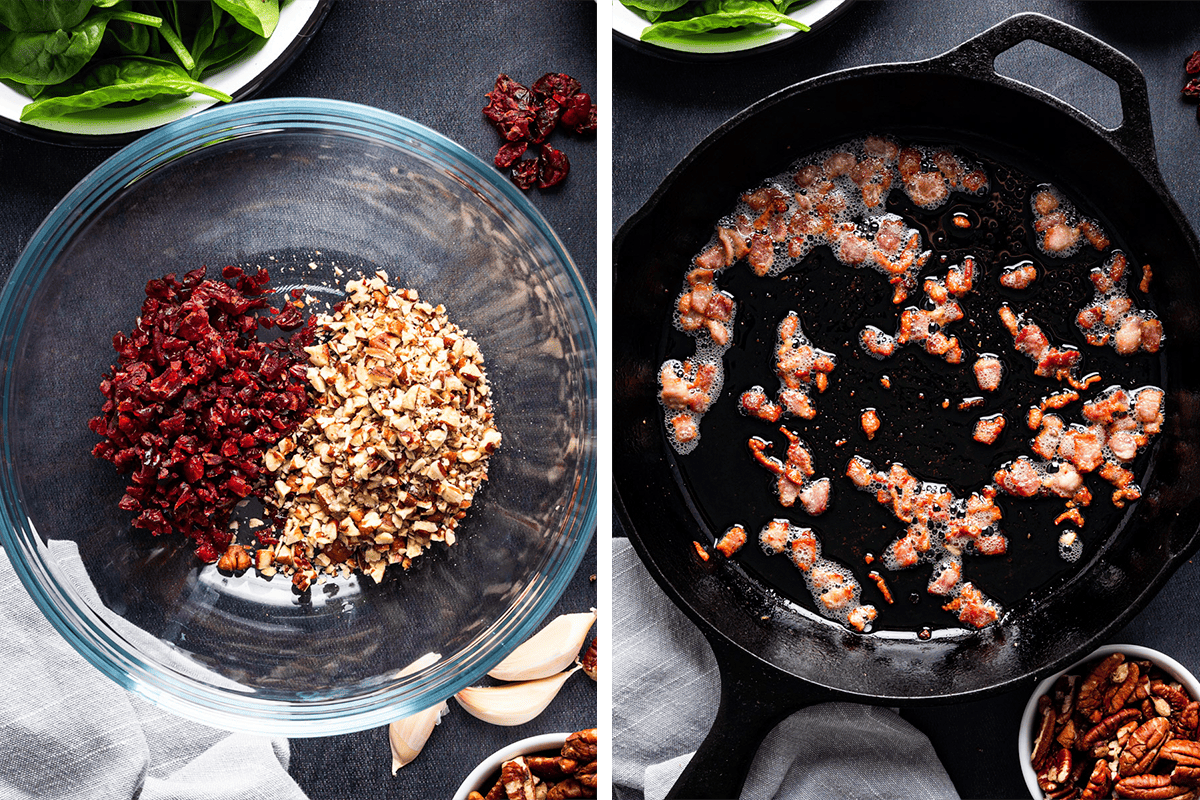 How to Make Stuffed Pork Tenderloin (Step-by-Step Photos) A glass bowl with chopped dried cranberries and nuts sits on a dark surface; next to it, diced bacon sizzles in a black cast iron skillet, surrounded by spinach leaves, garlic, and pecans.