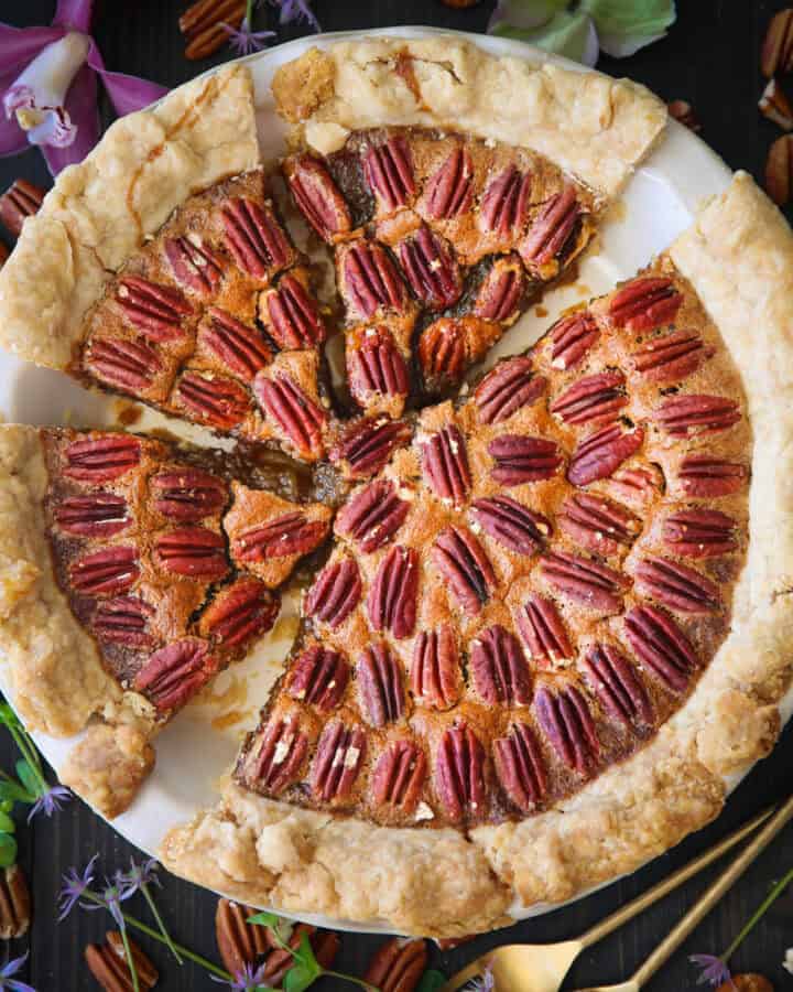Pecan Pie in a white pie dish.