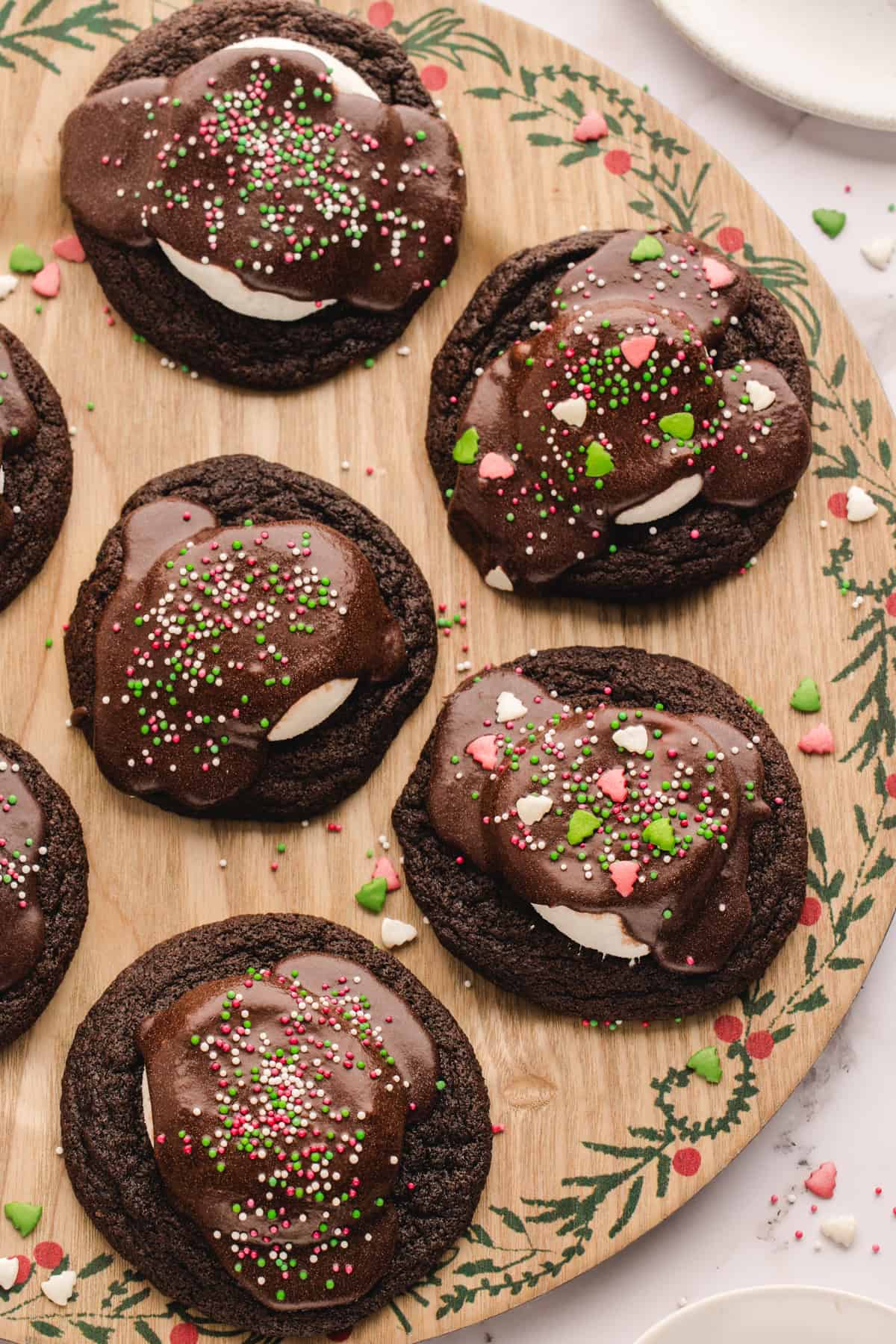 Hot Cocoa Cookies Hot Cocoa Cookies (topped with sprinkles) - on a tan platter.