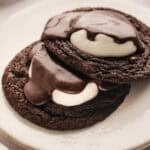 2 Hot Cocoa Cookies with Marshmallows on a small plate.