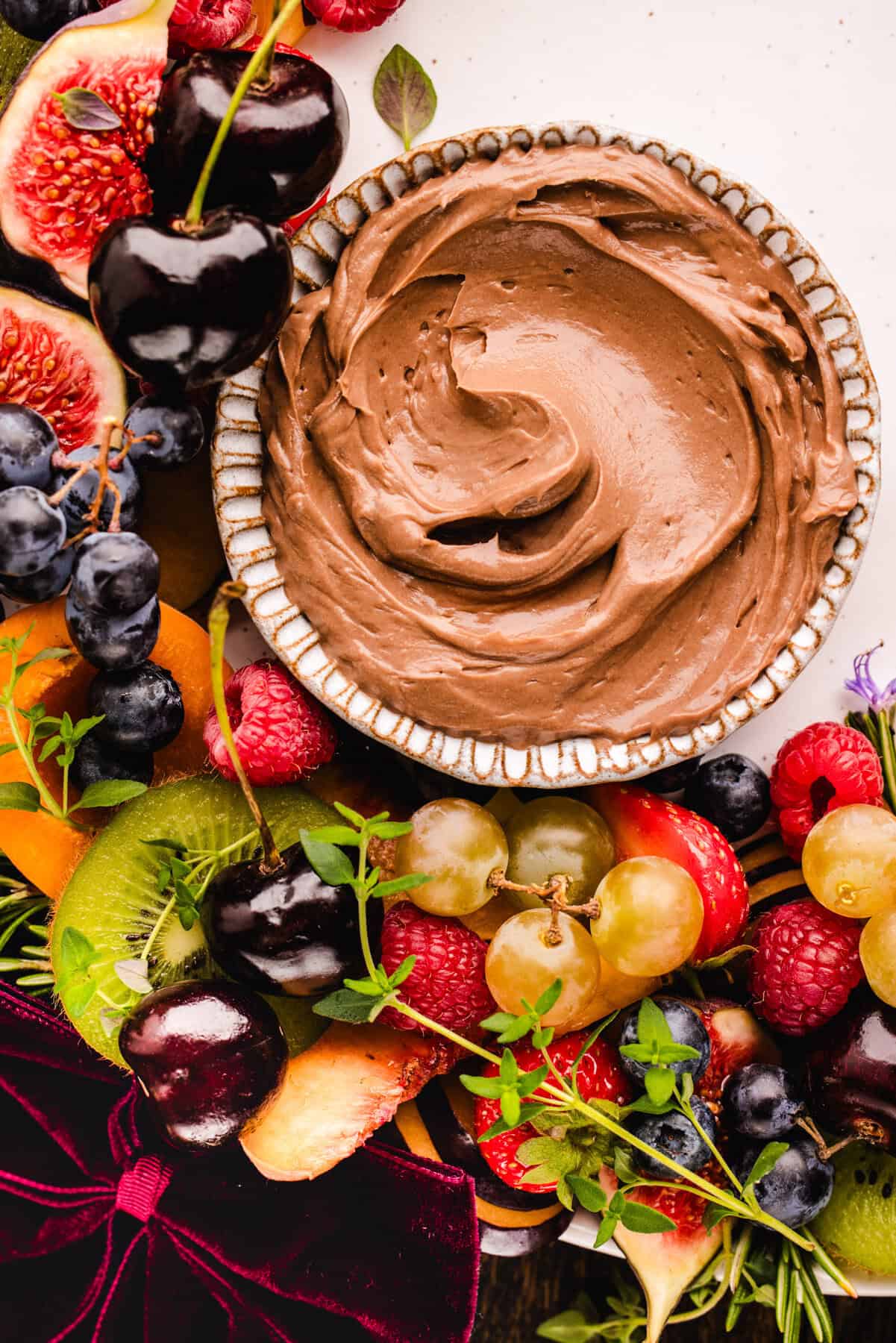 Fruit Platter with Nutella Dip Close-up of the fruit platter with the focus on the nutella dip in a bowl.