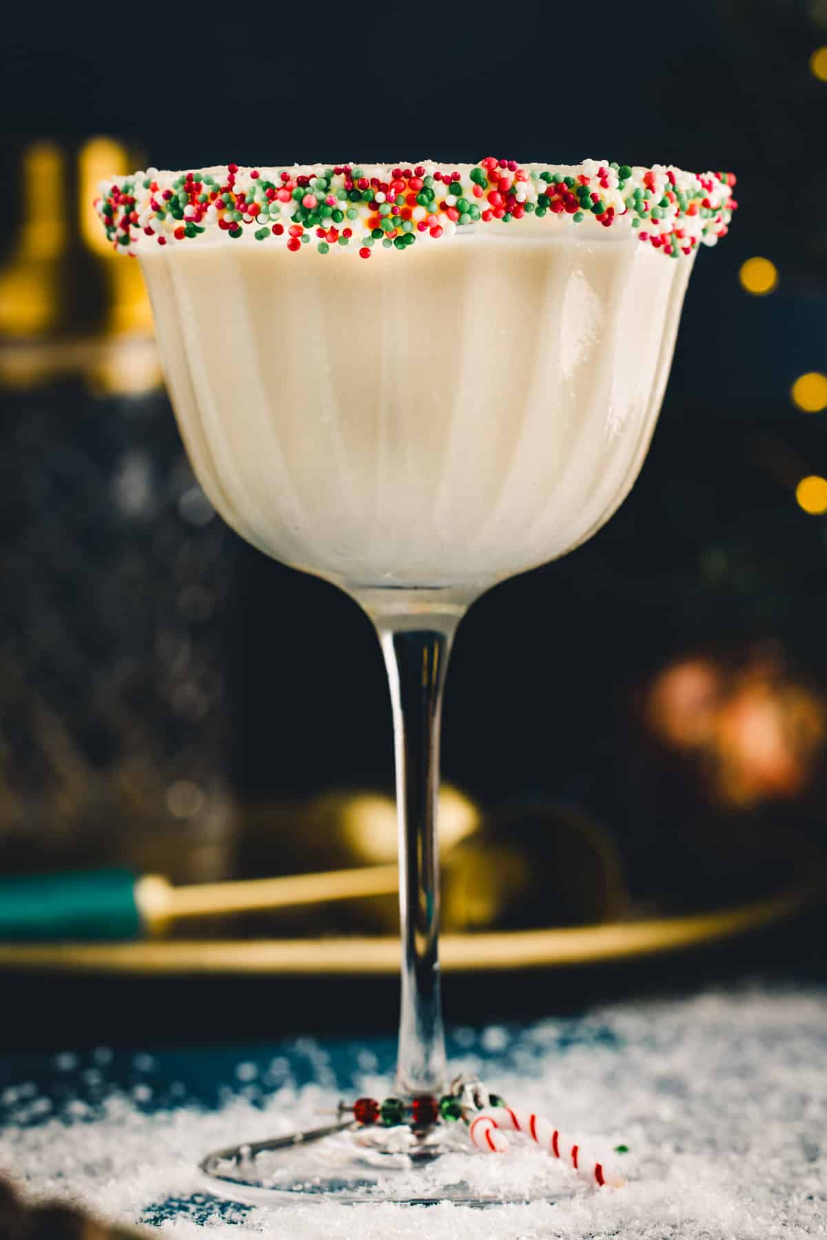 Sugar Cookie Martini (with festive holiday sprinkles around the rim of the martini glass).