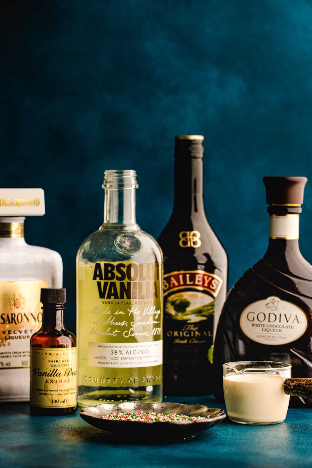 The ingredients (liquor bottles) for the Sugar Cookie Martini.