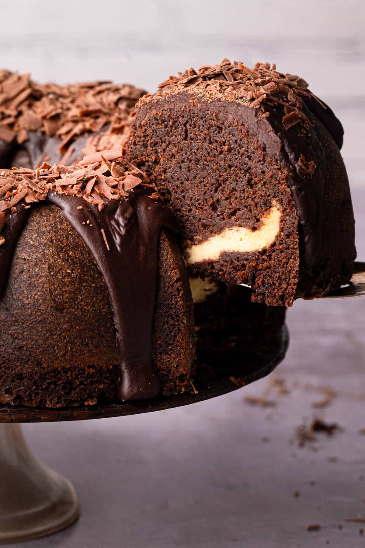 Guinness chocolate bundt cake with a slice cut out.