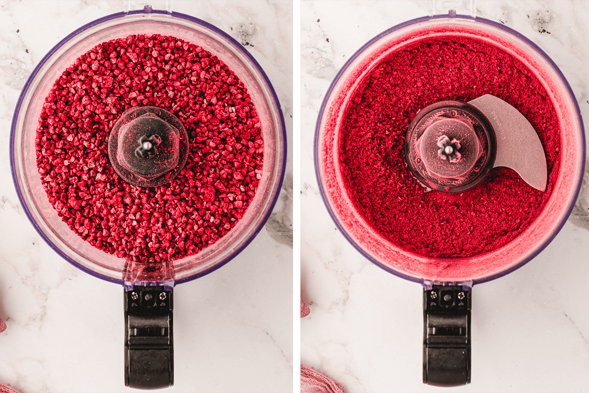 Side-by-side images of a food processor: the left shows crushed freeze-dried raspberries in small pieces, and the right shows the raspberries finely ground into a red powder, both on a white marble surface.