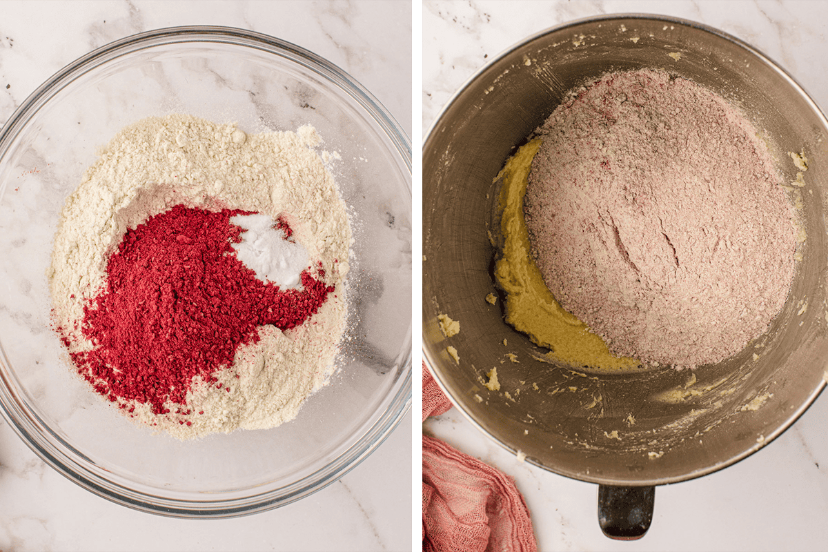 Two mixing bowls: the left contains white flour with red ground raspberry powder on top, the right shows a metal bowl with a beige batter and red flour mixture on top, both on a marble surface.