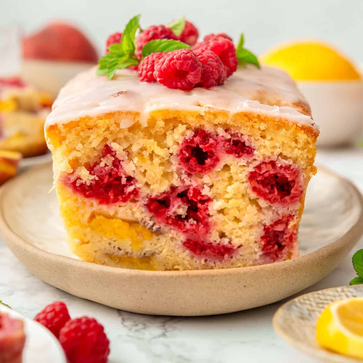 Raspberry Peach Loaf Cake with Lemon Glaze (15 Minutes of Prep!) Raspberry Peach Loaf Cake with Lemon Glaze (15 Minutes of Prep!)