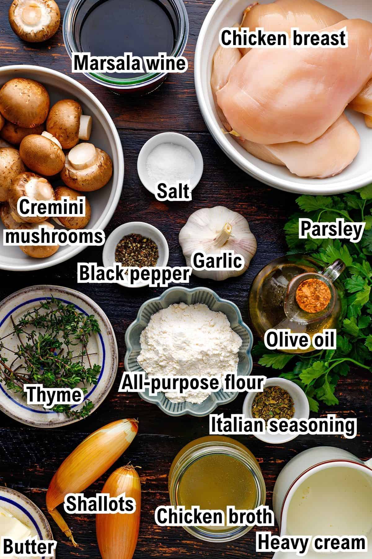 The Ingredients for Chicken Marsala This photo shows the ingredients for a chicken marsala recipe, including chicken breast, marsala wine, cremini mushrooms, flour, shallots, garlic, seasonings, parsley, olive oil, chicken broth, butter, and heavy cream.